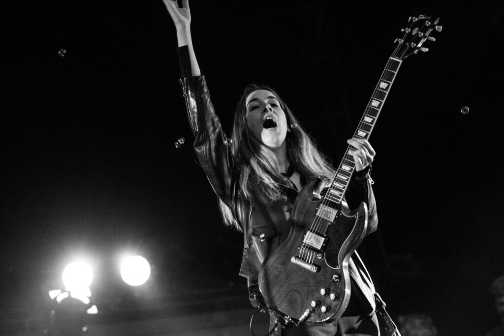 Danielle Haim of HAIM performing at the Boston Calling Music Festival on May 29, 2016
