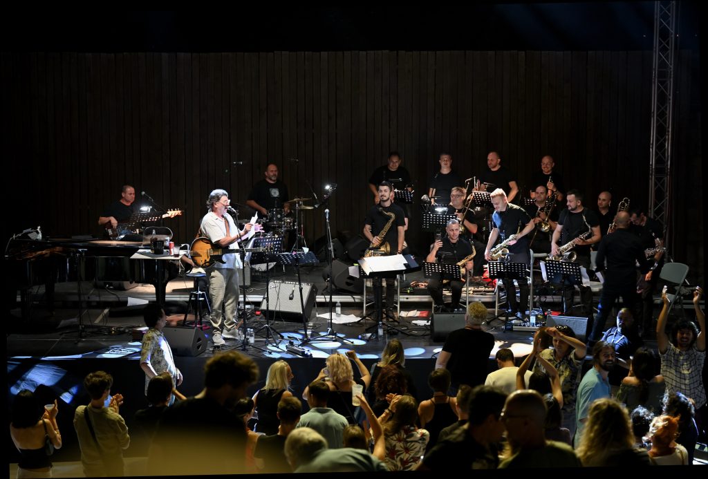 Rambo Amadeus reads the names of the Macedonian National Jazz Orchestra members - Shibenik June 25, 2024 / Archive of Music Nonstop Today / Photo: Vasil Buraliev.